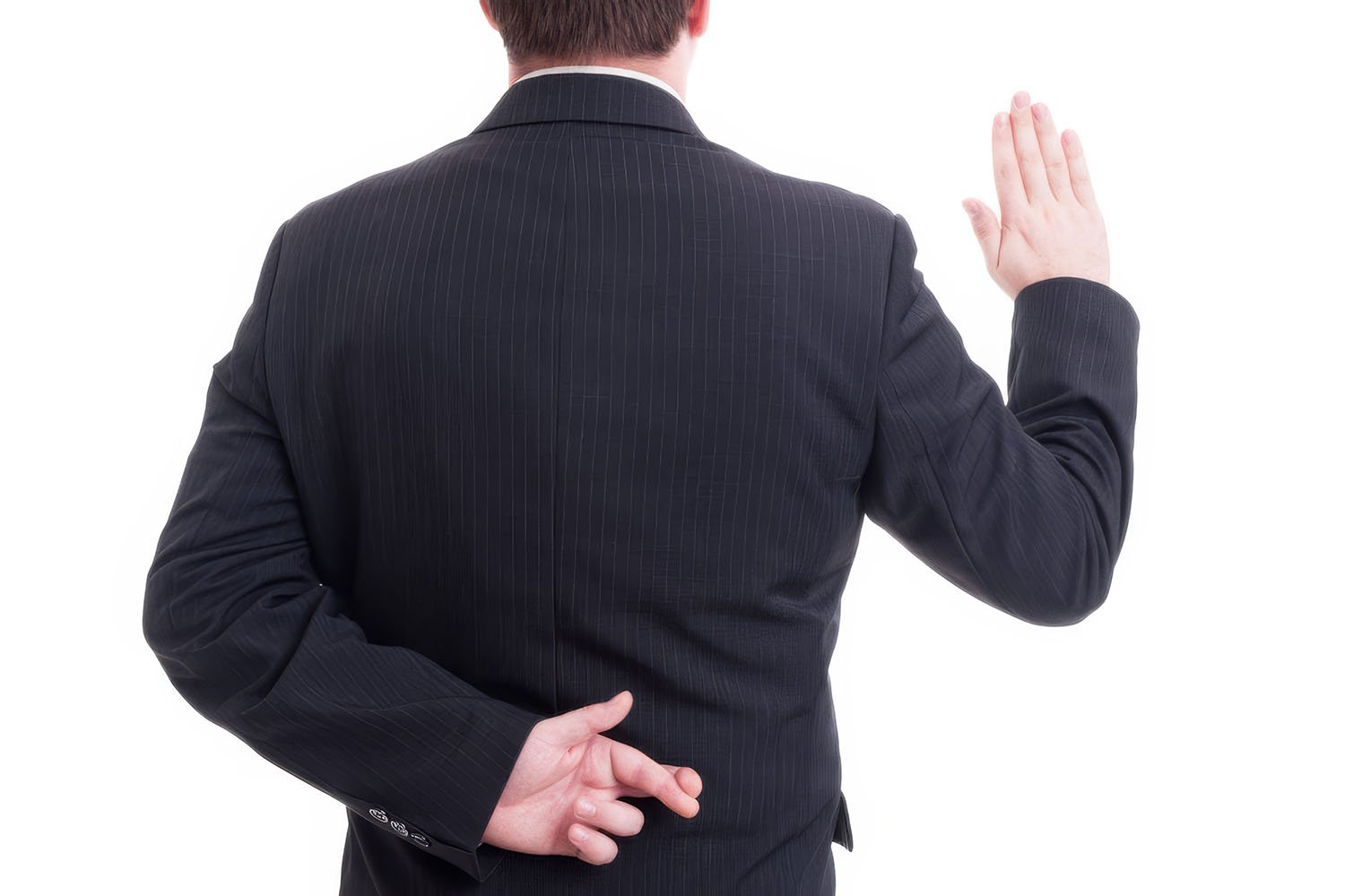 Business man swearing false with crossed fingers behing back